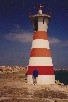 Lighthouse on the breakwater at Peniche